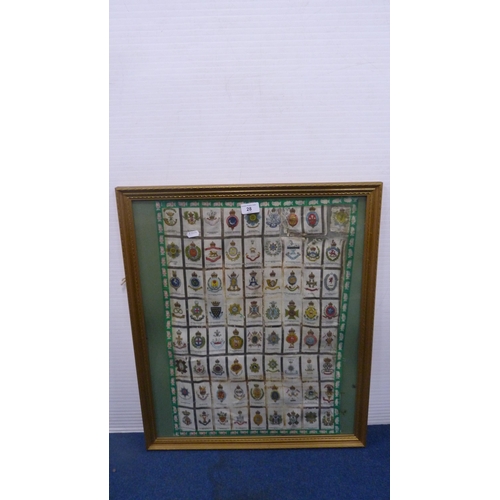 28 - Silk panel of various regimental crests, later framed and glazed.