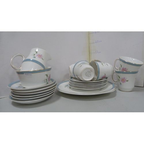 32 - Royal Grafton 'Gay Morning' pattern part tea set and a Royal Doulton 'Sonnet' pattern part tea set.