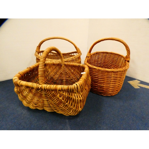 391 - Three wicker baskets.