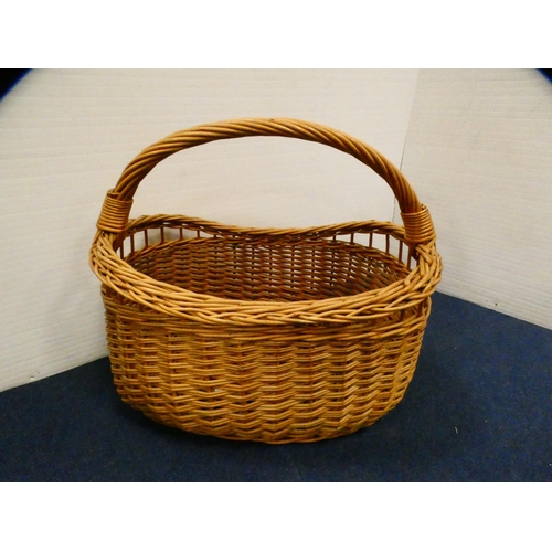 391 - Three wicker baskets.