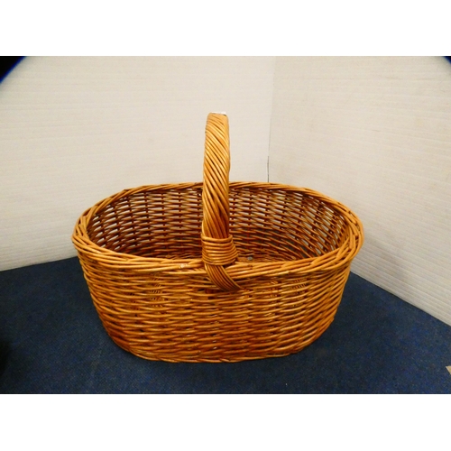 391 - Three wicker baskets.