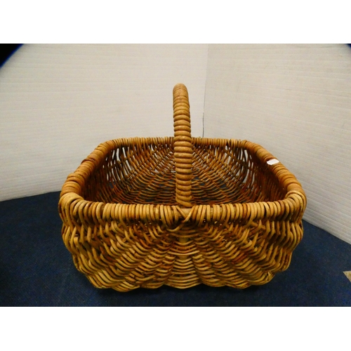 391 - Three wicker baskets.