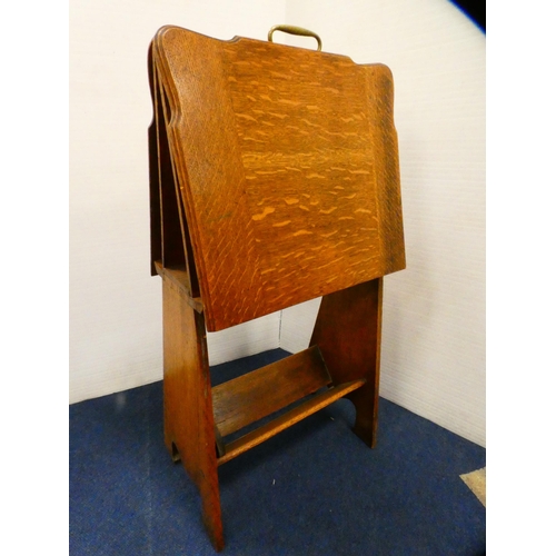 392 - Oak magazine table with brass handle.