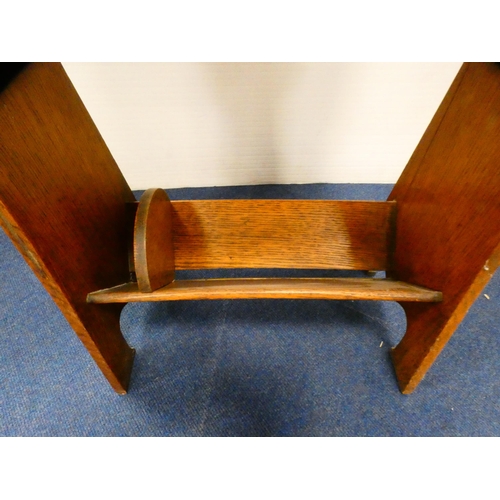 392 - Oak magazine table with brass handle.