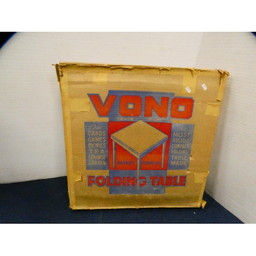 393 - Vono folding card table in original box.