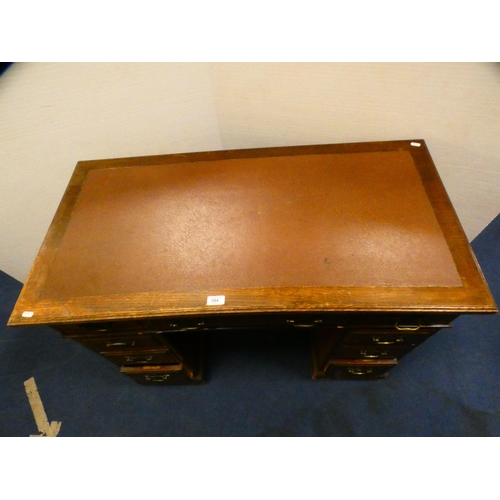 394 - Oak kneehole desk with secretaire drawer.