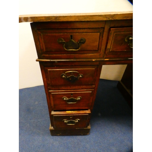 394 - Oak kneehole desk with secretaire drawer.