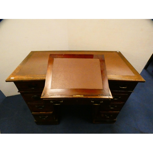 394 - Oak kneehole desk with secretaire drawer.