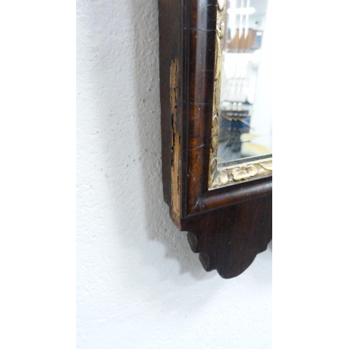 40 - Regency mahogany and gilt scroll wall mirror (a/f).