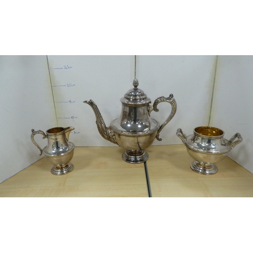 49 - Walker & Hall EP near-matching three-piece tea set with gilt interior to the cream and sugar, an... 