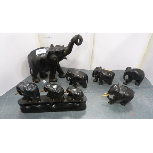 56 - African-style ebony elephants, wooden burr wood bowls, plate stands etc.