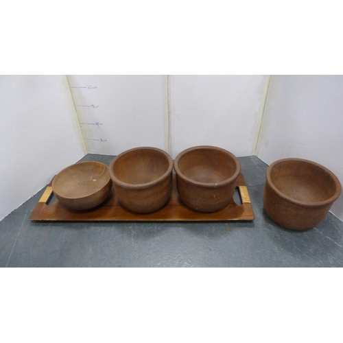 56 - African-style ebony elephants, wooden burr wood bowls, plate stands etc.