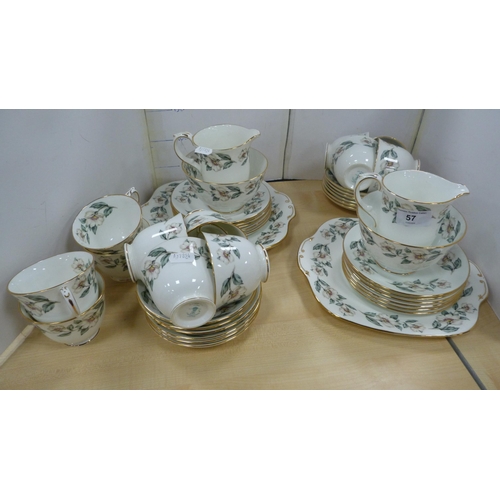 57 - Crown Staffordshire bone china floral decorated twelve-place tea set.