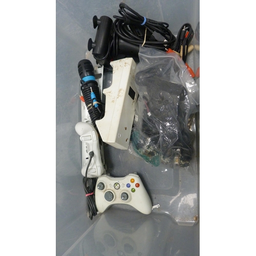 59 - Carton containing four Xbox 360 games consoles, an Xbox One console and various controllers (used co... 