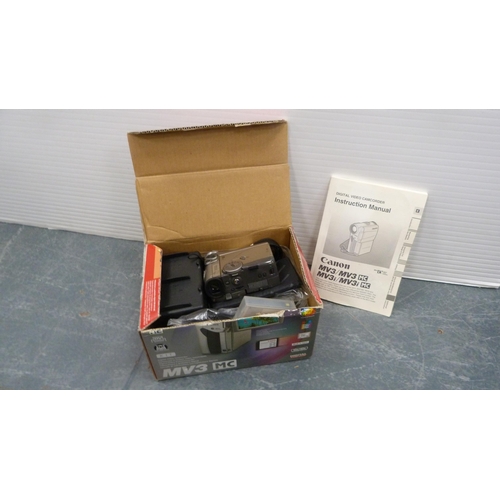 60 - Carton containing camera equipment to include a VHS camera, Viewmaster, Canon camcorder, Hanimex cam... 