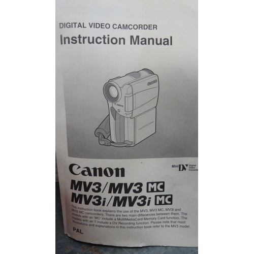 60 - Carton containing camera equipment to include a VHS camera, Viewmaster, Canon camcorder, Hanimex cam... 