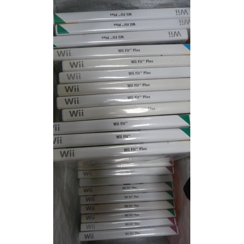 63 - Bag containing Nintendo Wii games to include Wii Fit and Wii Fit Plus etc.