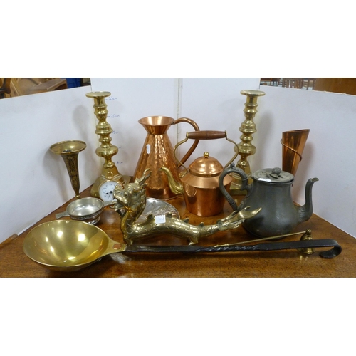 67 - Copper and brassware to include a large pair of brass candlesticks, copper jug, Indian gu-shaped vas... 