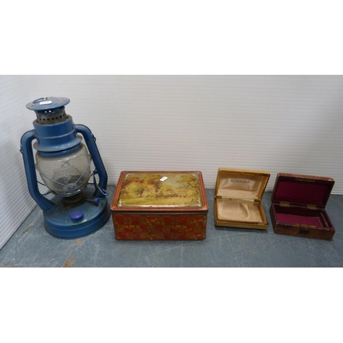 70 - Carton containing ladies' shoes, tin, napery, paraffin lamp, HMV gramophone case (case only), assort... 