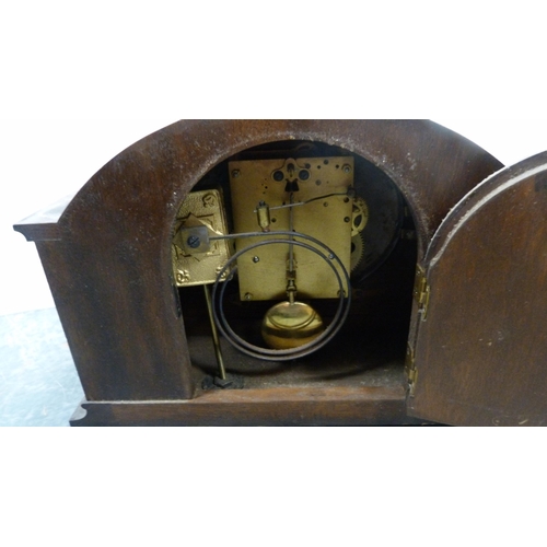 73 - Oak-cased Westminster chime mantel clock, another mantel clock and a letter rack.  (3)