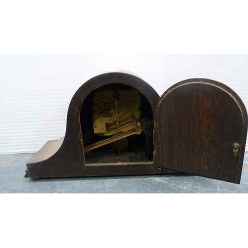 73 - Oak-cased Westminster chime mantel clock, another mantel clock and a letter rack.  (3)