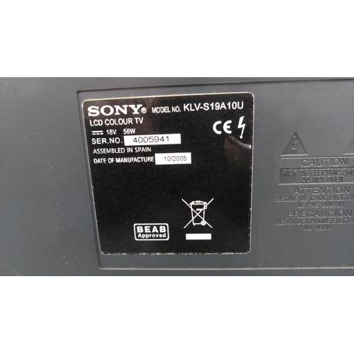 79 - Sony Bravia television and remote control and a Dell monitor.  (2)