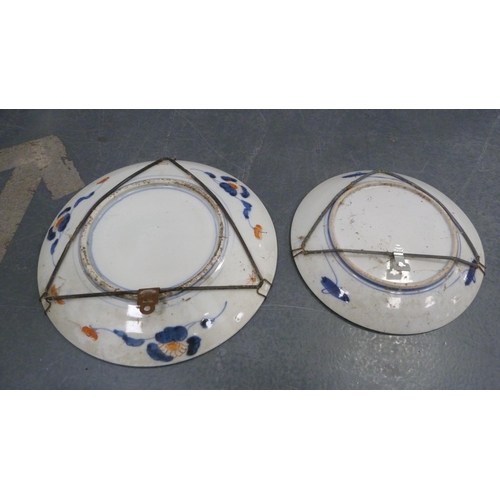 86 - Two Japanese Imari wall chargers.