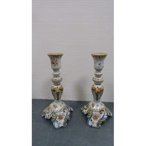 87 - Pair of Rouen-style faience porcelain candlesticks (a/f).  (2)