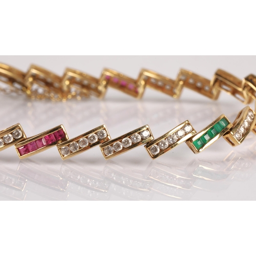 102 - 18ct gold bracelet set with white, blue, green, and pink gemstones, 14.4g