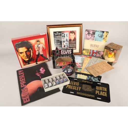 350 - Assorted Elvis Presley memorabilia, to include puzzles, figures, Elvis Duck, Corgi car etc