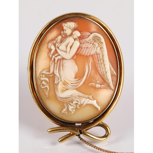 98 - Yellow metal cameo brooch, an angel with two infants, 6cm x 4.5cm, 18.5g