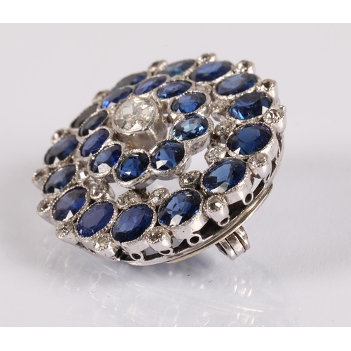 99 - White metal brooch set with diamonds and sapphires, 8.6g, 3cm x 2.5cm