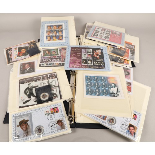 360 - Collection of Elvis Presley stamps, first day covers, collectable coins, in two folders