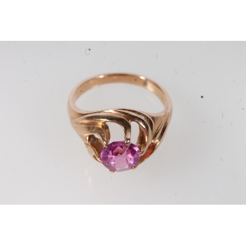 552 - 14kt gold ladies dress ring set with pink stone, 6.2g.