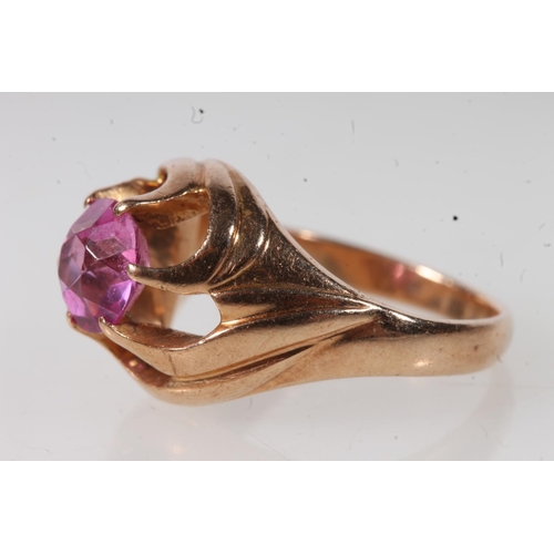 552 - 14kt gold ladies dress ring set with pink stone, 6.2g.