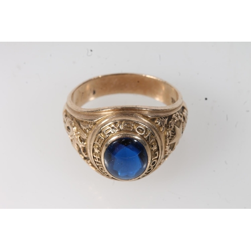 556 - Yellow metal Bryson high school ring, set with blue stone, stamped 10k.