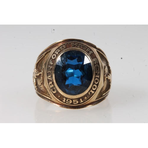 557 - Yellow metal Cranford high school ring, set with blue stone, stamped 10k.