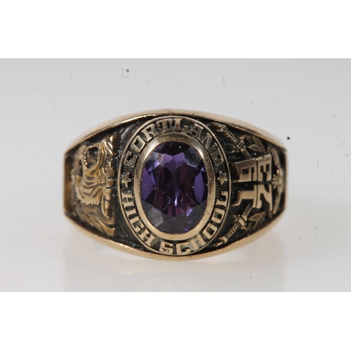 562 - Yellow metal Cortland high school ring, set with purple stone, stamped 10k.