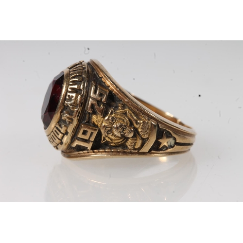 563 - Yellow metal Saucon Valley high school ring, set with red stone, stamped 10k.