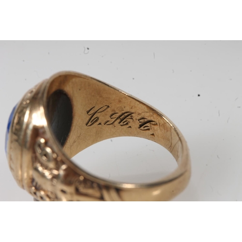 565 - Yellow metal mount pleasant high school ring, set with blue stone, stamped 10k.