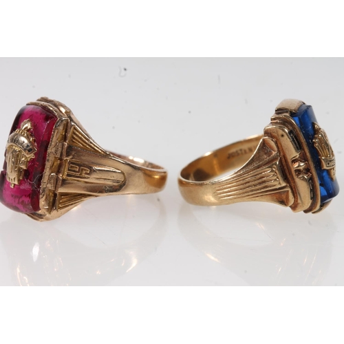 567 - Two yellow metal gents rings set with pink and blue stones, both stamped 10k.