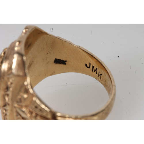 568 - Yellow metal American graduation ring, stamped 10k.