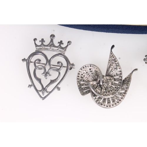 588 - Sterling silver Luckenbooth brooch, pendants, a silver brooch and other costume jewellery.