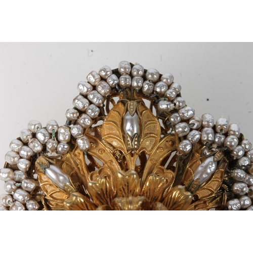 589 - Miriam Haskell gilt costume jewellery brooch with central flowerhead set with round faux pearl.