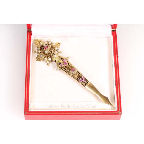 590 - Yellow metal gemstone, pink ruby and pearl set flowerhead brooch of large form.Originally purchased ... 