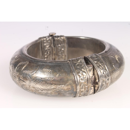 623 - Two Danecraft sterling silver bangles, 27g and a white metal bangle. 