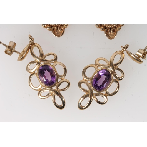 635 - Two pairs of 9ct gold amethyst set earrings, 10.1g.