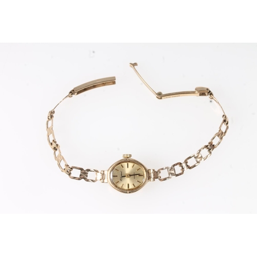 637 - 9ct gold H.Samuel ladies wristwatch on 9ct gold strap, 8.8g, with workings.