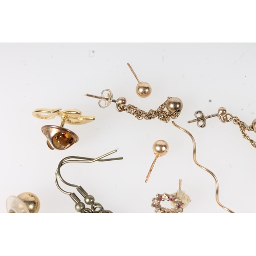 646 - Collection of 9ct gold and other earrings, citrine set earrings etc.