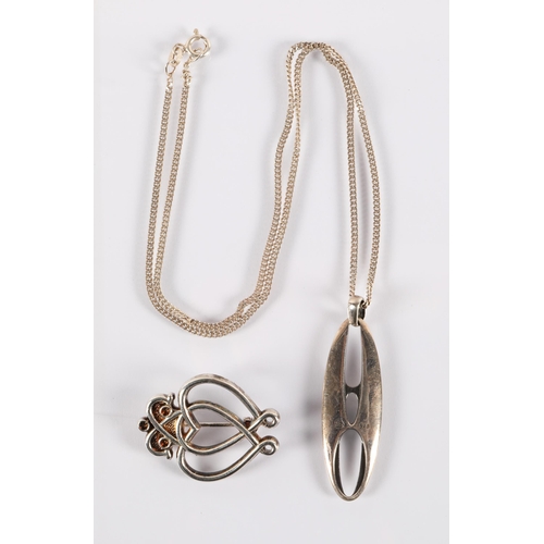 110 - Ortak Malcolm Gray silver pendant on chain, and unsigned white metal luckenbooth brooch